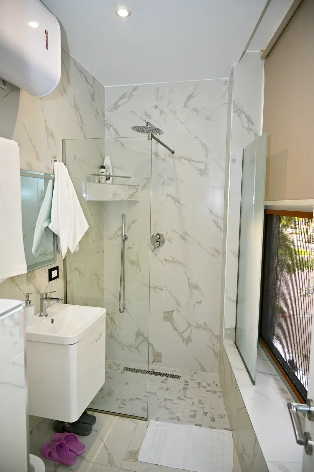 Walk-in shower in the renovated bathroom — Vila Emes, Plazh, Durrës