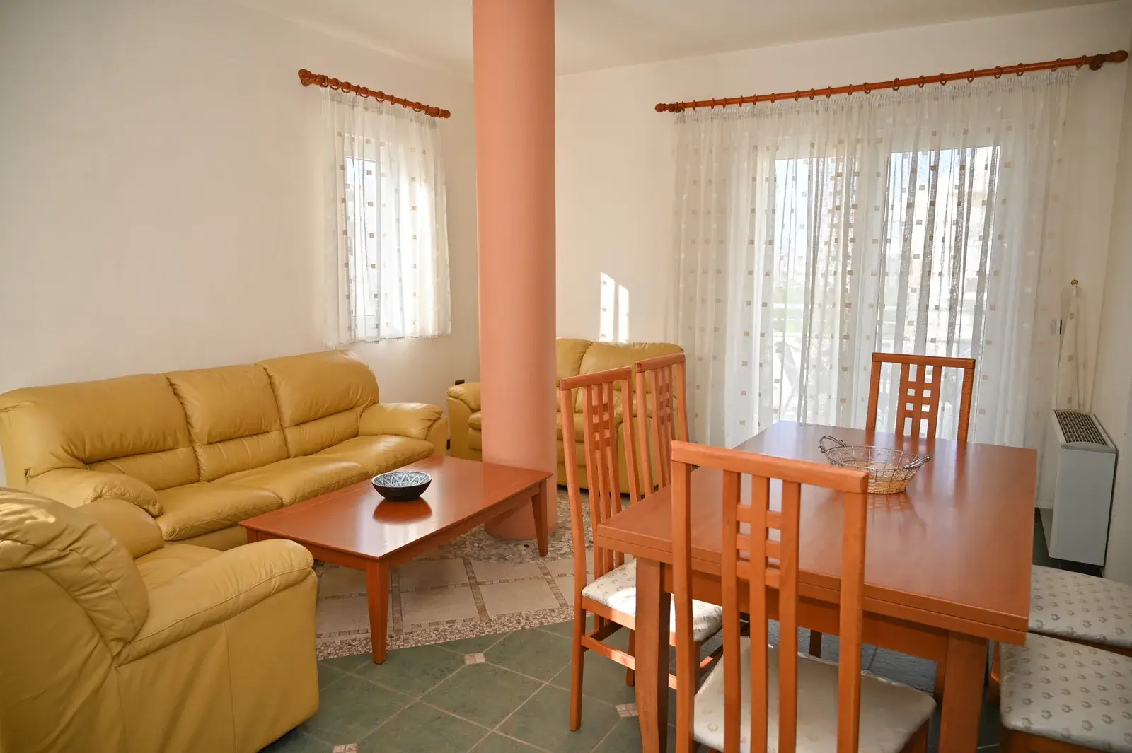 Living room with sofas and dining table — Vila Emes, Plazh, Durrës